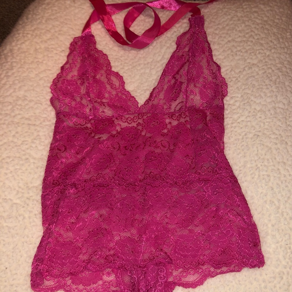 Hot pink, one-piece lingerie.